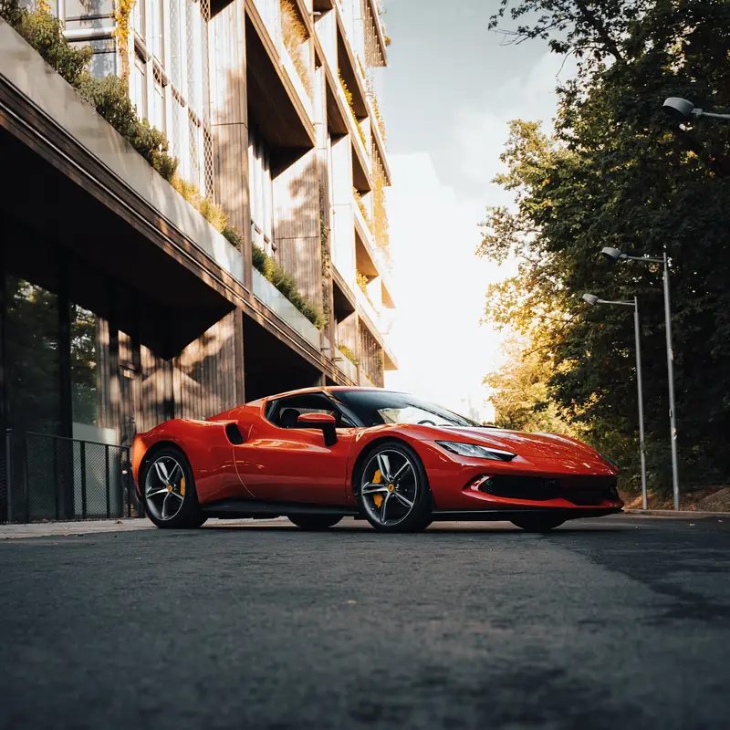 Ferrari 296 GTB rouge photographiée de trois quarts avant à Genève